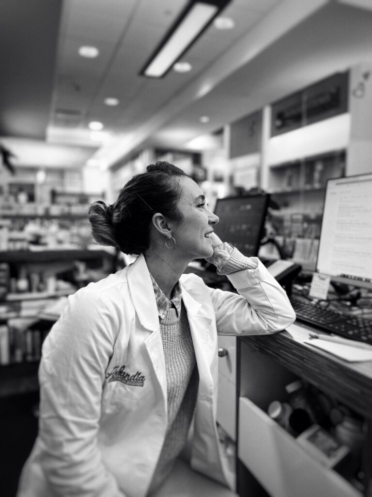 Pharmacist reviewing prior authorization for MAT medication coverage
